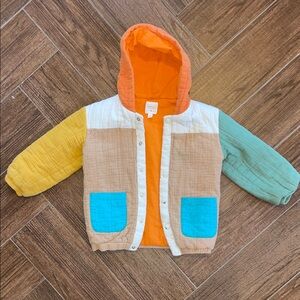 Christian Robinson Orange Jacket